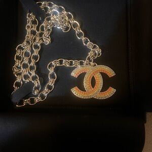 CHANEL gold Necklace with Gold and crystals cc  Logo Pendant